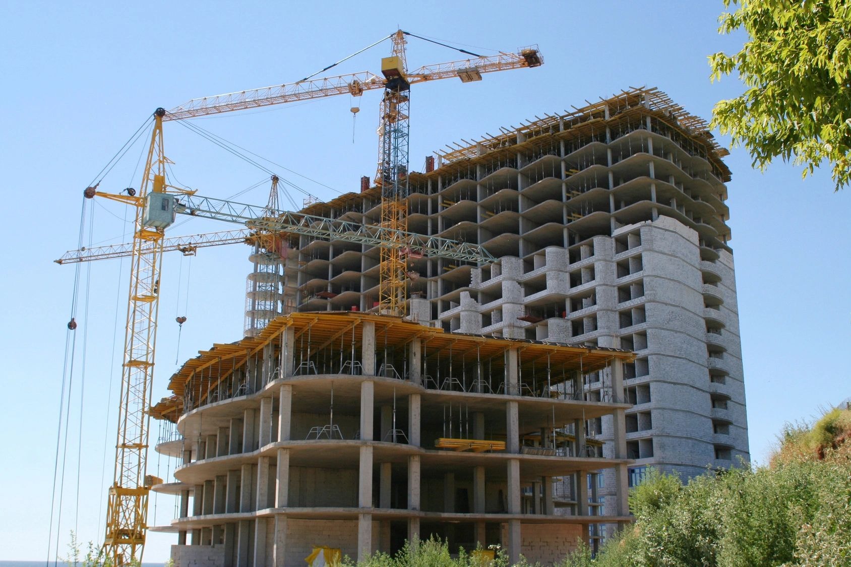 Construction site with cranes — land and homes in Marion County Tennessee